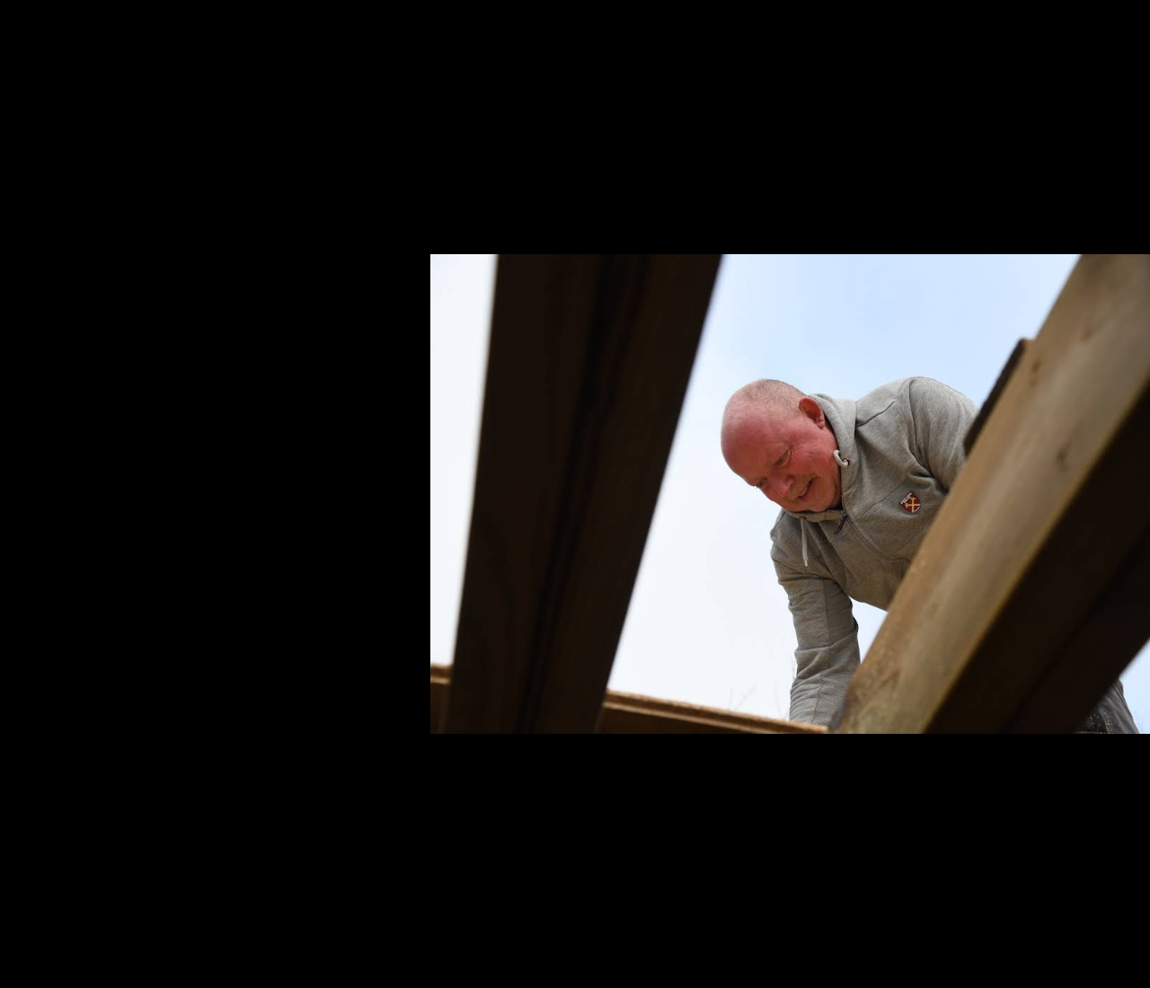 Adrian Bennett working on a garden room roof structure
